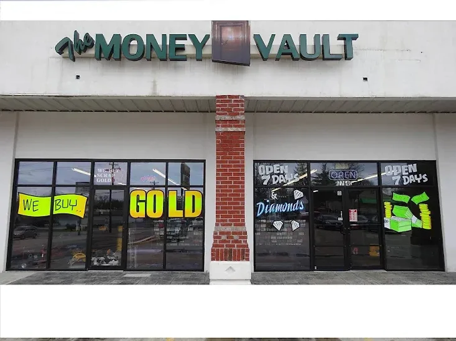 Front of The Money Vault store with its glass display windows